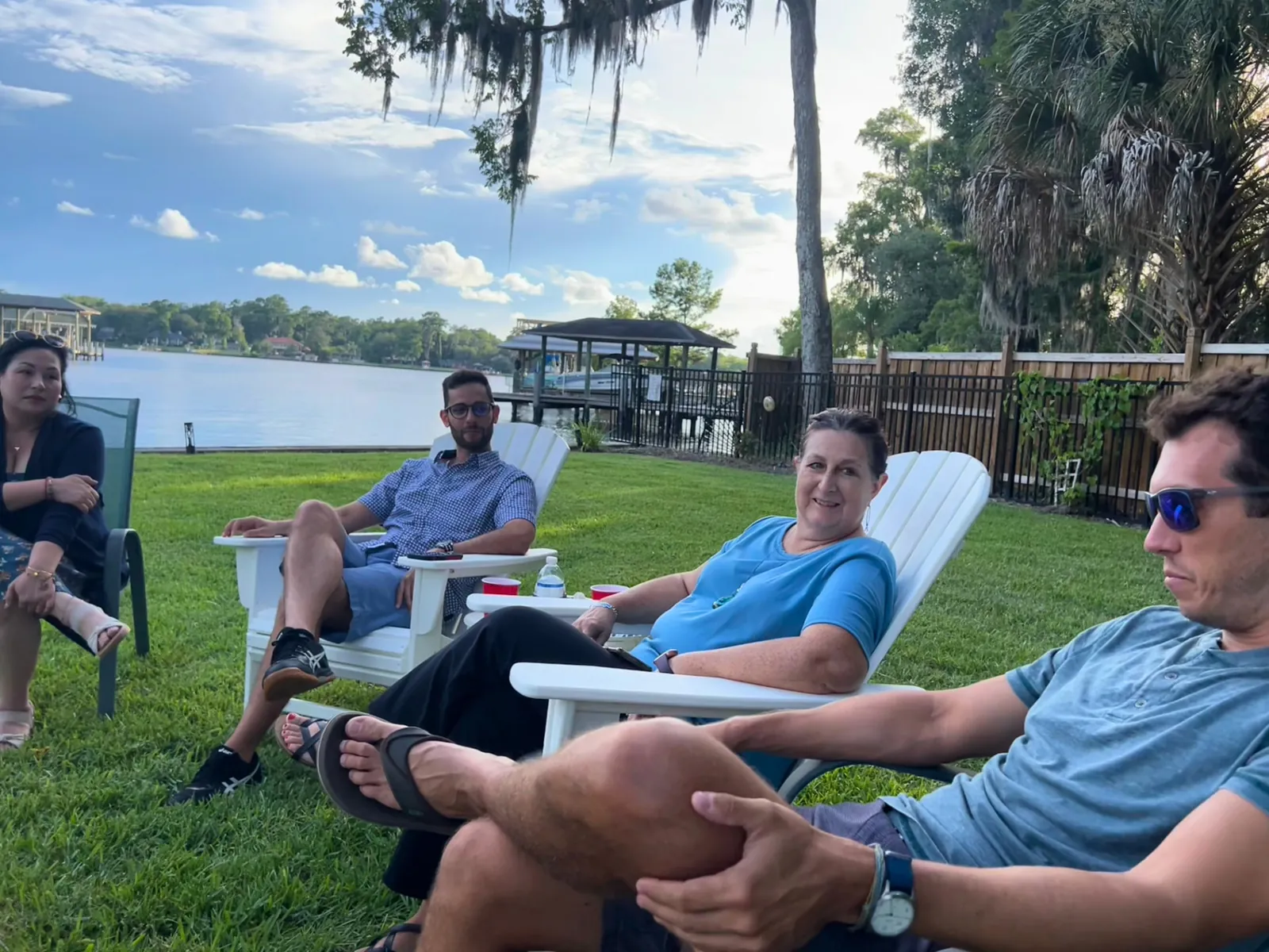 Faculty and fellows relaxing by the St. Johns River